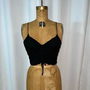 Cute blank scrunch tank that ties at the bottom!